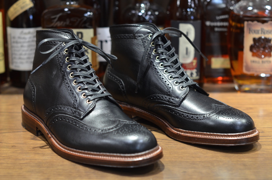 black leather wingtip boots